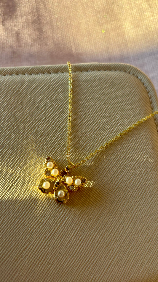 Cadena de mariposa con perlas